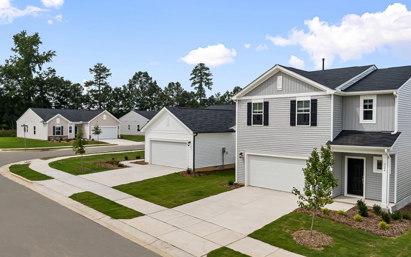 Exterior view of Abode at Geneva single family homes in Fuquay-Varina, NC with a two-car garage.